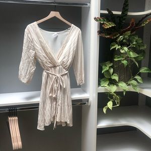 Striped white and beige wrap dress